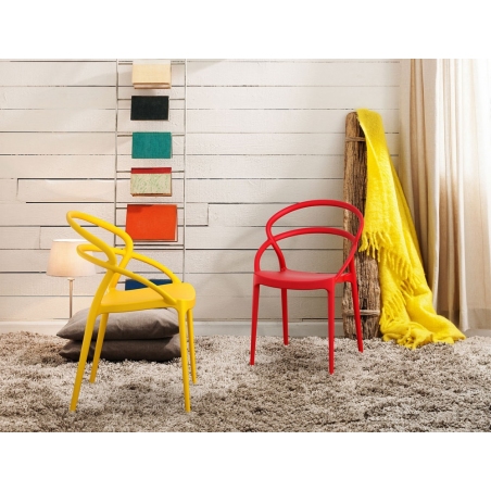 Mila yellow plastic chair with armrests Siesta