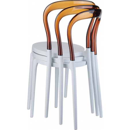 Designerskie Krzesło z tworzywa Bobo White Biały z bursztynowym przeźroczystym Siesta do jadalni, kuchni i salonu.