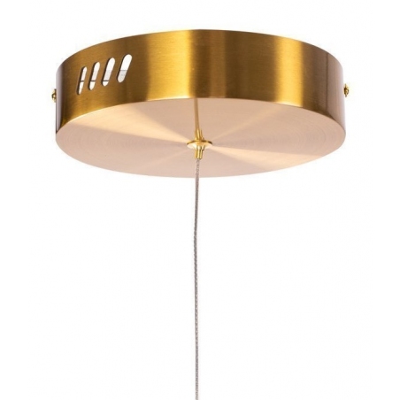 Designerska Lampa mosiężna wisząca Circle LED 60 Step Into Design nad stół.