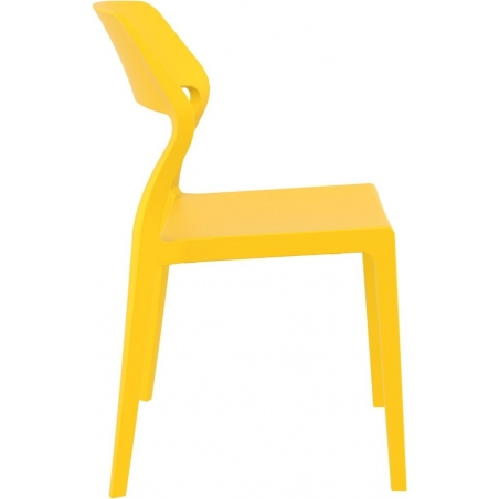 Stylowe Krzesło z tworzywa Snow Żółte Siesta do salonu i jadalni.